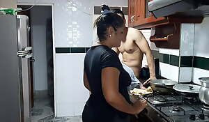 My stepmom gives me a delicious blowjob in the kitchen