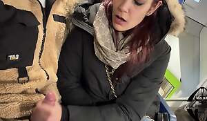 Handjob fast with cumming in the mouth between train seats