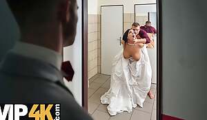 VIP4K. Brute locked in the bathroom, sexy bride doesnt lose time and seduces random guy