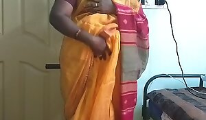 Desi indian horny tamil telugu kannada malayalam hindi cheating wife vanitha wearing orange colour saree showing fat boobs and shaved pussy press hard boobs press nip rubbing pussy masturbation
