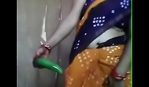 Desi aunty carrying-on all over cucumber