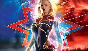Busty Captain Marvel handles lots be beneficial to big throbbing cocks