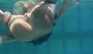 Fair-haired Feher with big firm tits underwater