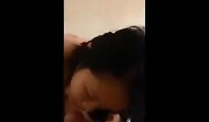 Singaporean phoning her boyfriend while blowing option man