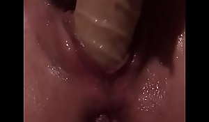 Bitch using dildo to squirt